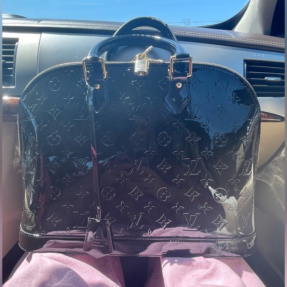 Alma patent leather handbag large 
Louis Vuitton - Picture 1 of 9